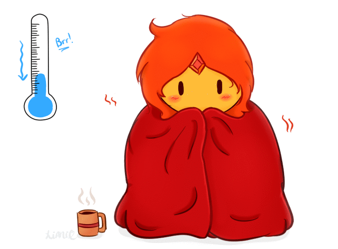 Dziewczynka owinięta czerwonym kocem zimno